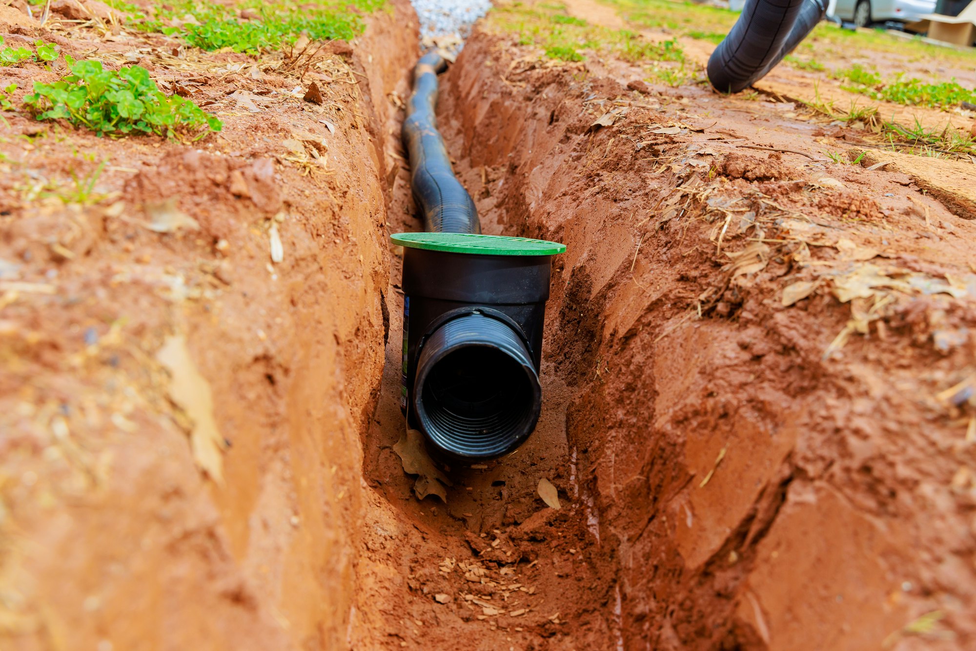 Laying underground drainage pipes for outflow of rainwater a stormwater